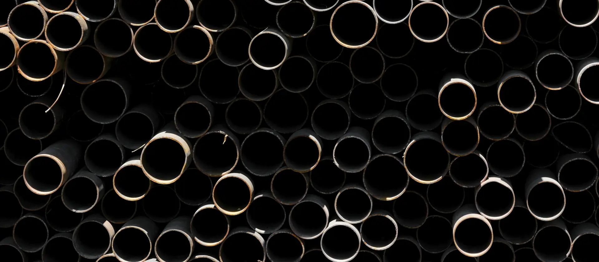Stacked used steel pipe